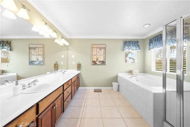 1625 Valley Falls Ave, Redlands, CA 92374 - bathroom featuring a garden tub, double vanity, ornamental molding, tile patterned floors, and baseboards
