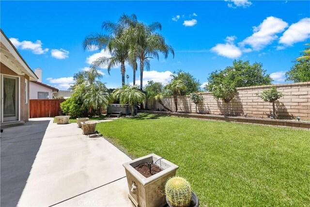 1625 Valley Falls Ave, Redlands, CA 92374 - fenced backyard with a patio area