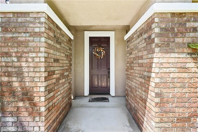 1625 Valley Falls Ave, Redlands, CA 92374 - entrance to property featuring brick siding and stucco siding
