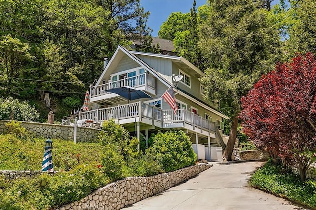27888 W Shore Rd, Lake Arrowhead, CA 92352 - view of front of home with driveway and a deck