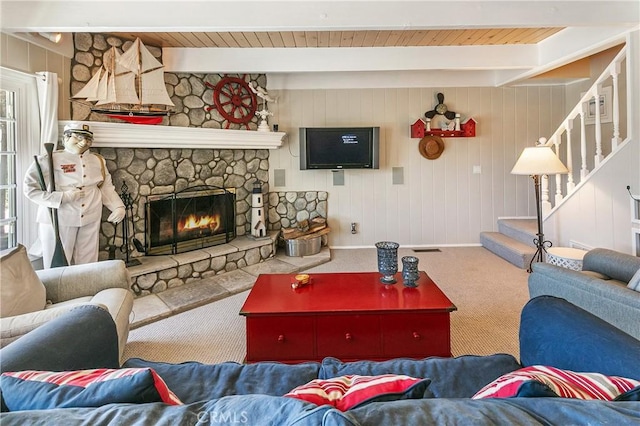 27888 W Shore Rd, Lake Arrowhead, CA 92352 - living room featuring carpet floors, a fireplace, stairs, wood ceiling with exposed beams, and baseboards