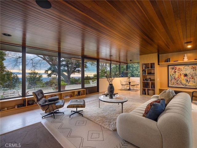 7 Cinchring Rd, Rolling Hills, CA 90274 - living room with wooden ceiling, healthy amount of natural light, and built in shelves
