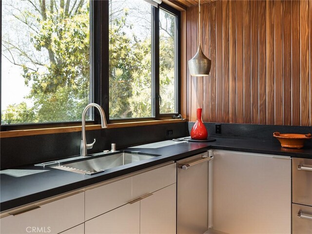 7 Cinchring Rd, Rolling Hills, CA 90274 - kitchen featuring a sink, dark countertops, and white cabinetry