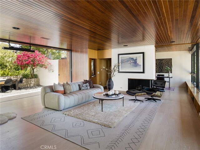 7 Cinchring Rd, Rolling Hills, CA 90274 - living room featuring wood ceiling and wood finished floors