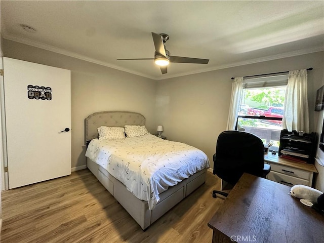 680 Chorro St Unit 18, San Luis Obispo, CA 93401 - bedroom with wood finished floors, crown molding, ceiling fan, and an office area