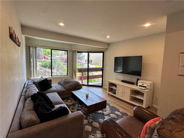 680 Chorro St Unit 18, San Luis Obispo, CA 93401 - living area featuring wood finished floors, recessed lighting, healthy amount of natural light, and a textured wall