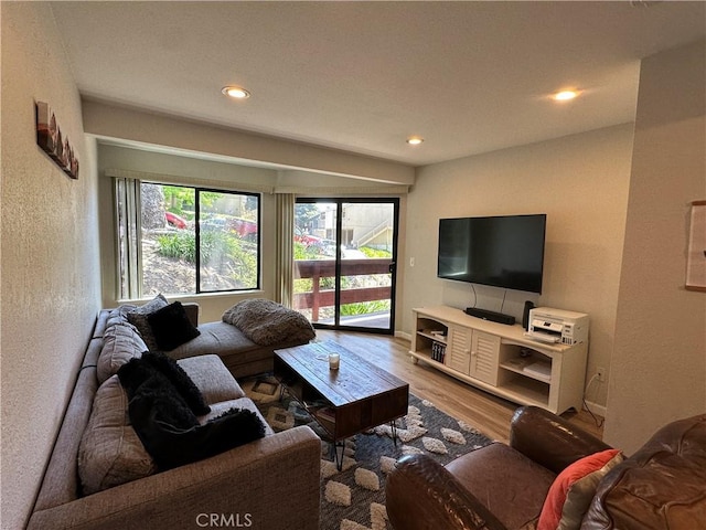 680 Chorro St Unit 18, San Luis Obispo, CA 93401 - living area featuring wood finished floors, recessed lighting, healthy amount of natural light, and a textured wall