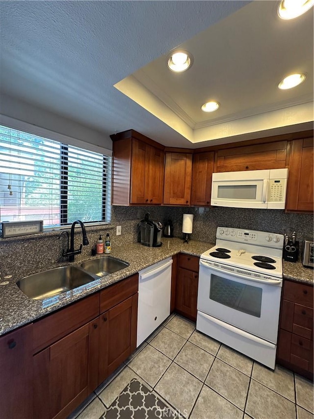 680 Chorro St Unit 18, San Luis Obispo, CA 93401 - kitchen with white appliances, decorative backsplash, light tile patterned flooring, a raised ceiling, and recessed lighting