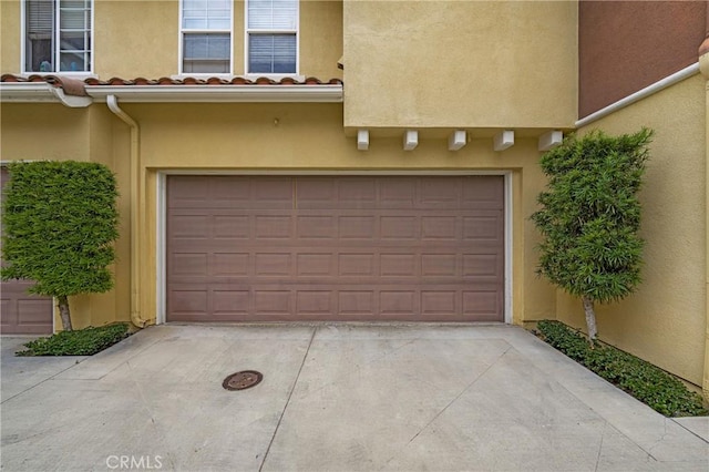 614 Timberwood, Irvine, CA 92620 - garage with concrete driveway