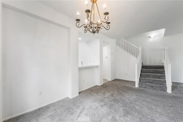614 Timberwood, Irvine, CA 92620 - unfurnished living room with carpet flooring, stairs, a chandelier, and baseboards