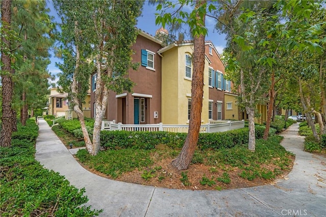 614 Timberwood, Irvine, CA 92620 - view of property exterior featuring stucco siding