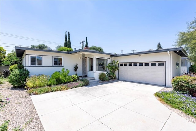 436 W Porter Ave, Fullerton, CA 92832 - ranch-style home featuring stucco siding, a garage, and driveway