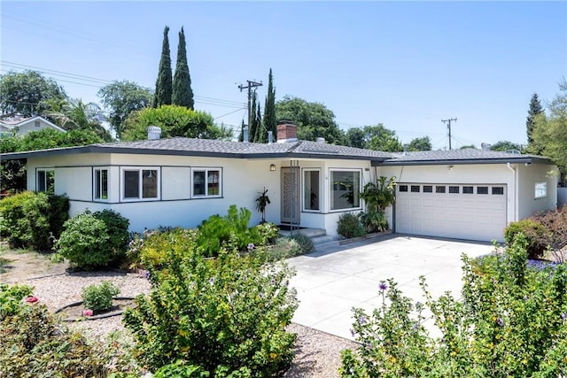 436 W Porter Ave, Fullerton, CA 92832 - ranch-style house with a garage, stucco siding, concrete driveway, and a chimney