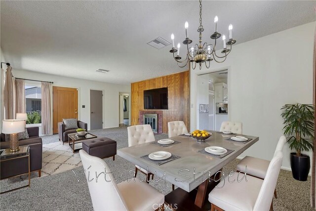 436 W Porter Ave, Fullerton, CA 92832 - dining area with light carpet and a chandelier