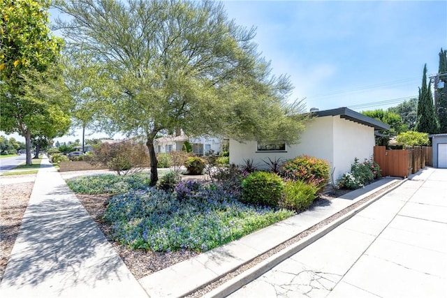 436 W Porter Ave, Fullerton, CA 92832 - view of front of house featuring stucco siding and a garage