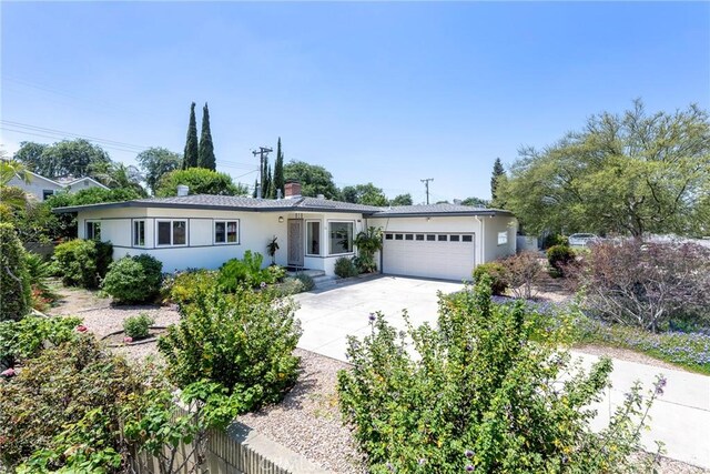 436 W Porter Ave, Fullerton, CA 92832 - ranch-style home featuring an attached garage, driveway, and stucco siding