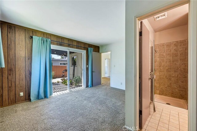 436 W Porter Ave, Fullerton, CA 92832 - carpeted empty room featuring wood walls