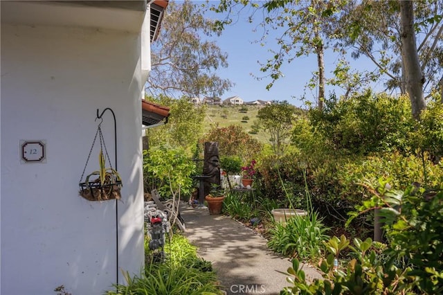 34101 Via California Unit 12, San Juan Capistrano, CA 92675 - view of side of property featuring stucco siding