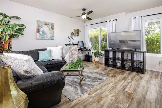 34101 Via California Unit 12, San Juan Capistrano, CA 92675 - living area with ceiling fan and wood finished floors