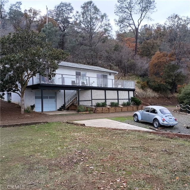 10098 Crestview Dr, Clearlake, CA 95424 - view of front of property featuring stairs, a wooden deck, and a front yard