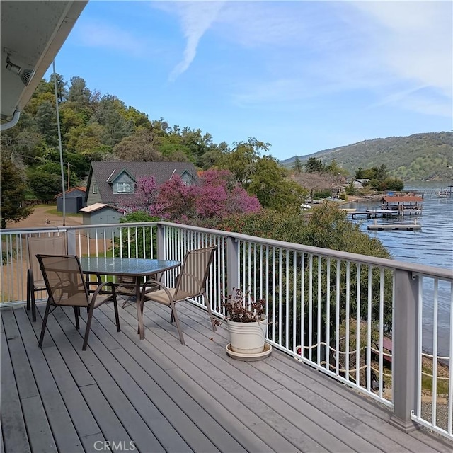 10098 Crestview Dr, Clearlake, CA 95424 - deck featuring a water view and outdoor dining area