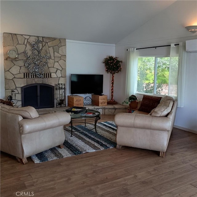 10098 Crestview Dr, Clearlake, CA 95424 - living area featuring vaulted ceiling, wood finished floors, a fireplace, and ornamental molding