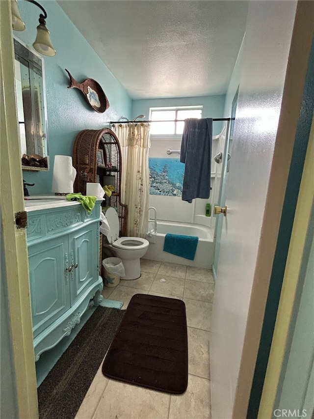 161 Janet Ave, Grover Beach, CA 93433 - full bath with shower / bath combination with curtain, toilet, vanity, a textured ceiling, and tile patterned floors