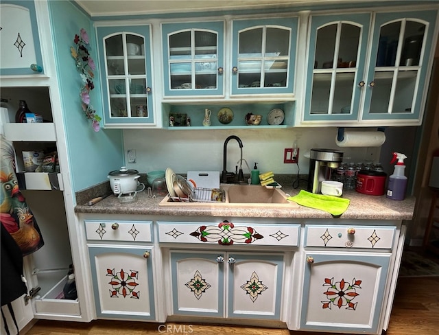 161 Janet Ave, Grover Beach, CA 93433 - kitchen featuring a sink and glass insert cabinets
