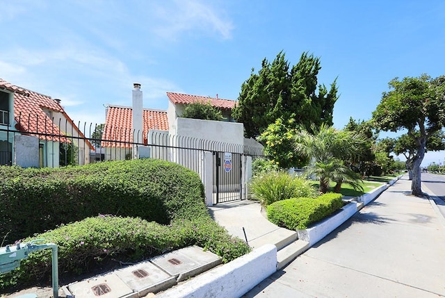 13905 Magnolia St, Garden Grove, CA 92844 - view of home's community with a gate