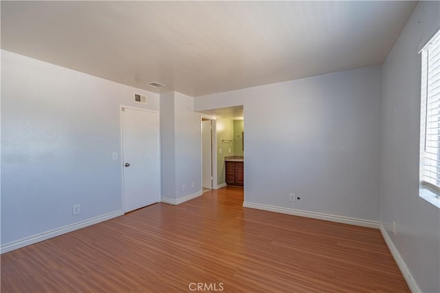 13905 Magnolia St, Garden Grove, CA 92844 - empty room featuring wood finished floors and baseboards