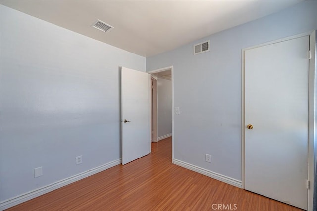 13905 Magnolia St, Garden Grove, CA 92844 - unfurnished bedroom featuring light wood-style flooring and baseboards