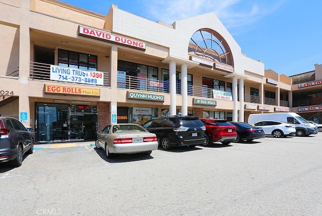 13905 Magnolia St, Garden Grove, CA 92844 - view of commercial property featuring uncovered parking