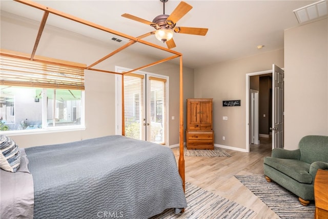 23840 Costa Mesa Way, Murrieta, CA 92562 - bedroom with french doors, access to outside, light wood-type flooring, ceiling fan, and baseboards