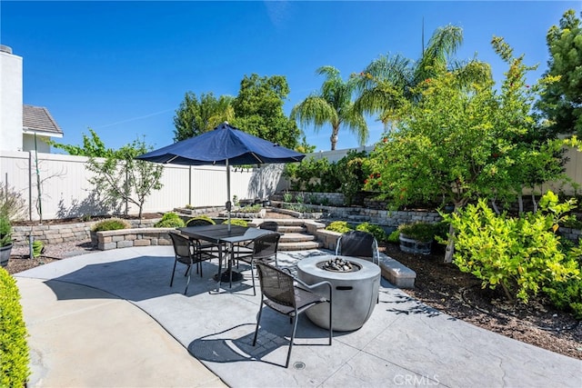 23840 Costa Mesa Way, Murrieta, CA 92562 - view of patio / terrace with a fire pit and outdoor dining area