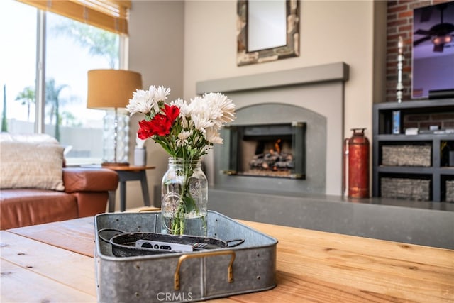 23840 Costa Mesa Way, Murrieta, CA 92562 - living area with a lit fireplace