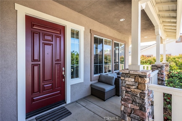 23840 Costa Mesa Way, Murrieta, CA 92562 - doorway to property with a porch and stucco siding