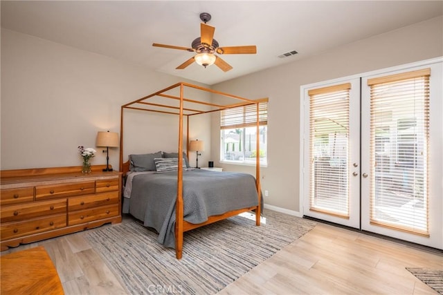 23840 Costa Mesa Way, Murrieta, CA 92562 - bedroom featuring access to exterior, light wood-type flooring, french doors, and a ceiling fan