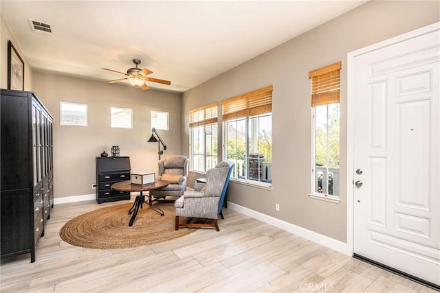 23840 Costa Mesa Way, Murrieta, CA 92562 - sitting room featuring ceiling fan, baseboards, healthy amount of natural light, and light wood-style flooring