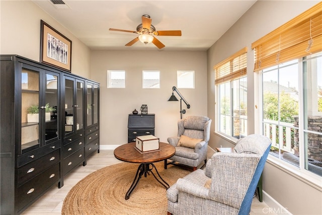 23840 Costa Mesa Way, Murrieta, CA 92562 - sitting room featuring a ceiling fan, light wood finished floors, and baseboards