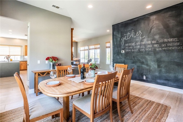 23840 Costa Mesa Way, Murrieta, CA 92562 - dining area with light wood-style floors, plenty of natural light, recessed lighting, and baseboards