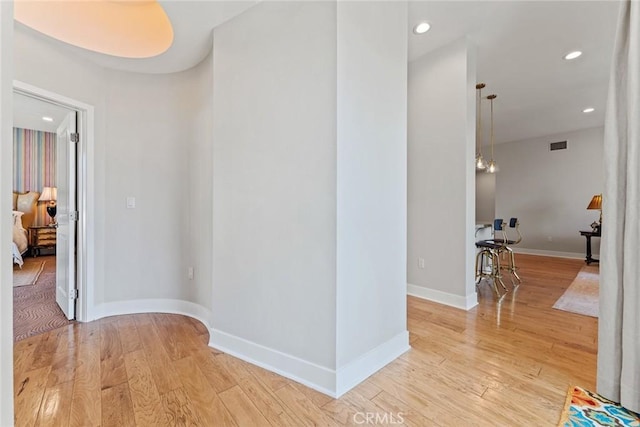 402 Rockefeller Unit 407, Irvine, CA 92612 - spare room with light wood-style flooring, baseboards, and recessed lighting