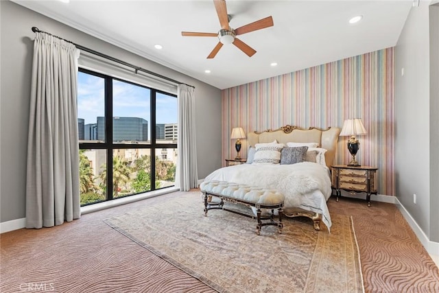 402 Rockefeller Unit 407, Irvine, CA 92612 - carpeted bedroom featuring baseboards, wallpapered walls, a city view, recessed lighting, and a ceiling fan