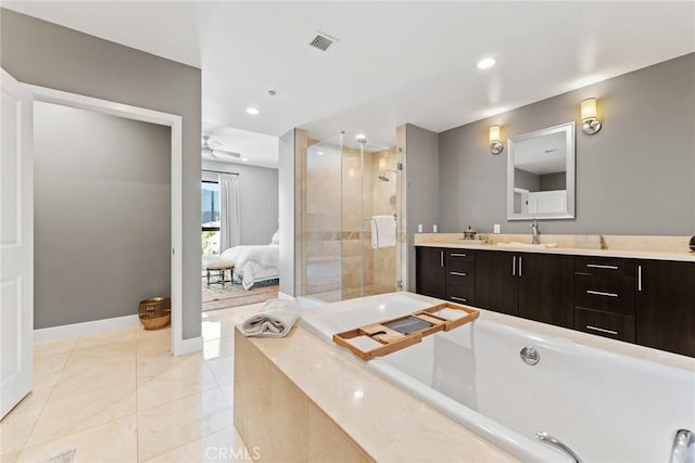 402 Rockefeller Unit 407, Irvine, CA 92612 - bathroom with a stall shower, a garden tub, vanity, baseboards, and a ceiling fan