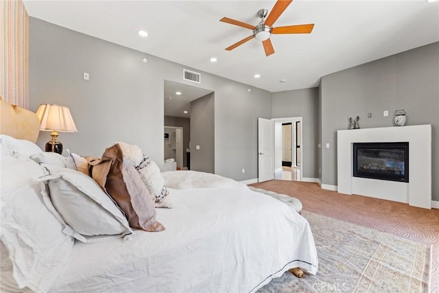 402 Rockefeller Unit 407, Irvine, CA 92612 - bedroom featuring carpet floors, a glass covered fireplace, baseboards, recessed lighting, and ceiling fan