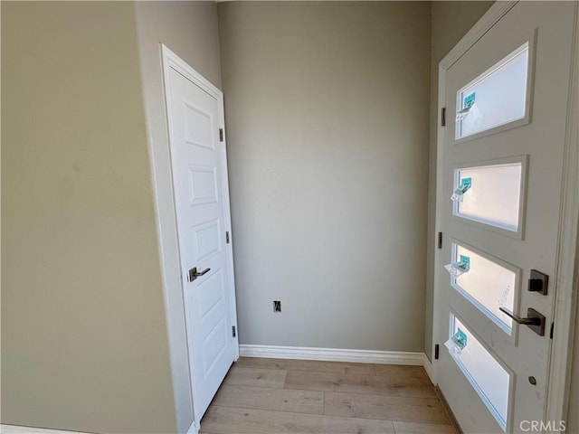 16063 Spruce St, Hesperia, CA 92345 - doorway featuring light wood-style floors and baseboards