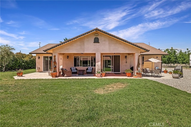 11576 Meridian Rd, Chico, CA 95973 - rear view of house with a patio area, stucco siding, a yard, and an outdoor hangout area