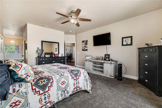 11576 Meridian Rd, Chico, CA 95973 - bedroom featuring dark carpet, a chandelier, baseboards, and ceiling fan