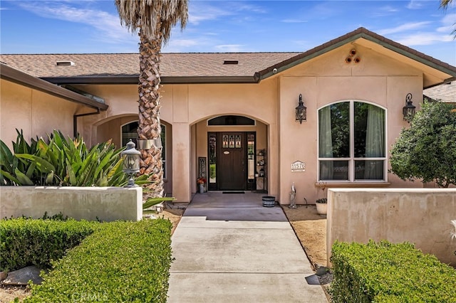 11576 Meridian Rd, Chico, CA 95973 - doorway to property featuring stucco siding and covered porch