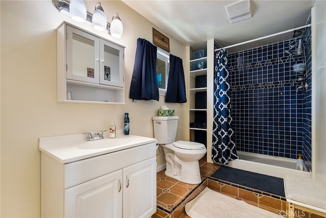 11576 Meridian Rd, Chico, CA 95973 - full bath featuring toilet, vanity, a tile shower, and tile patterned flooring