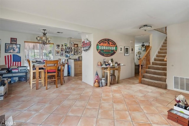 28532 Forest Meadow Pl, Castaic, CA 91384 - dining space with stairway, a chandelier, and light tile patterned floors